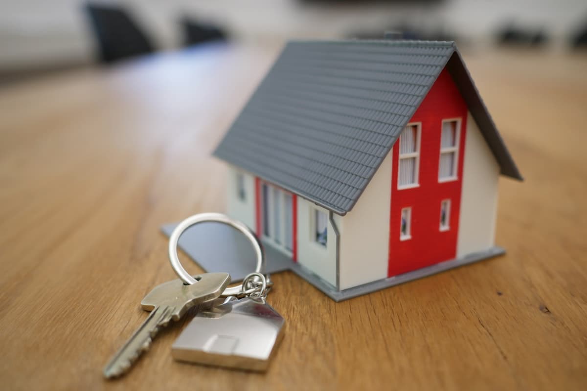 House model with keys representing property conveyancing services